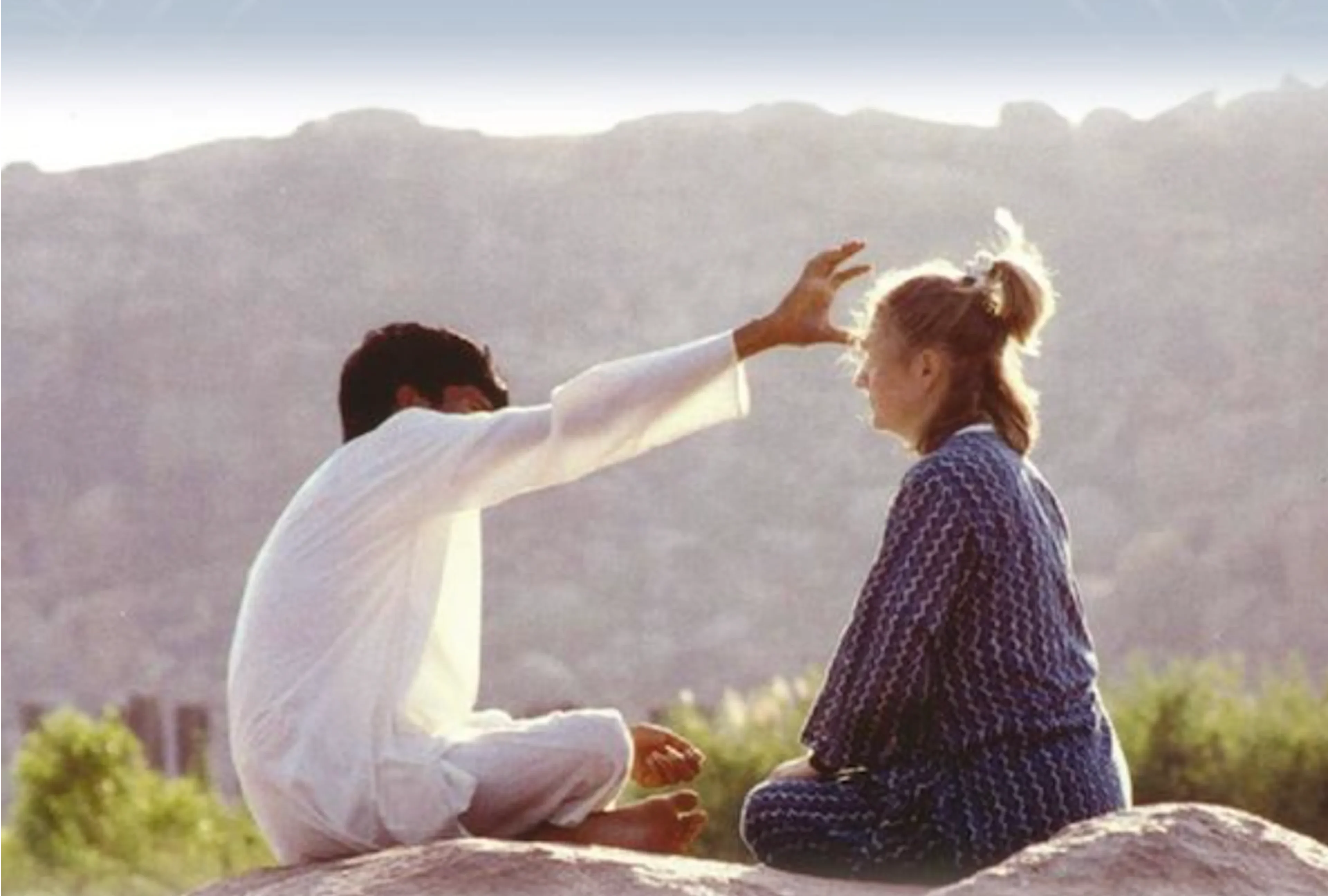 82e73003-2386-4aa8-975b-2d83aed2752d 1 (3) A man and woman sitting on the ground