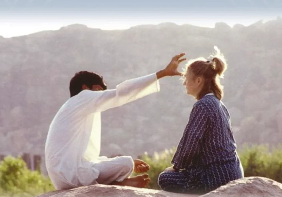 82e73003-2386-4aa8-975b-2d83aed2752d 1 (3) A man and woman sitting on the ground